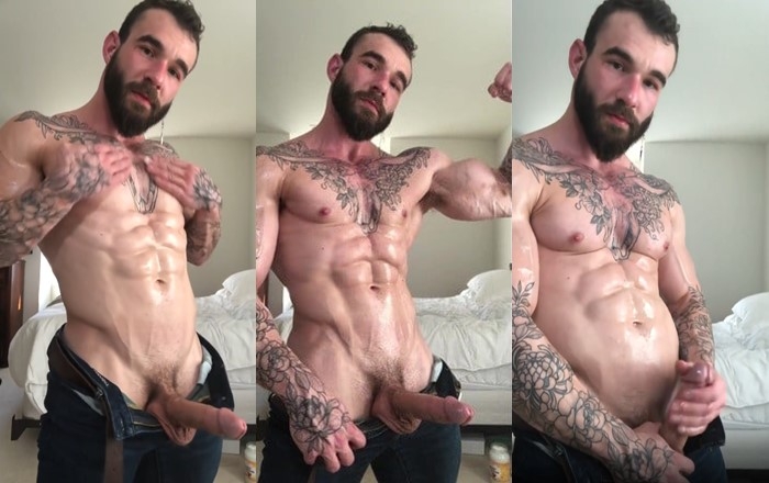 gifted muscular guy with tattoos and a sexy beard